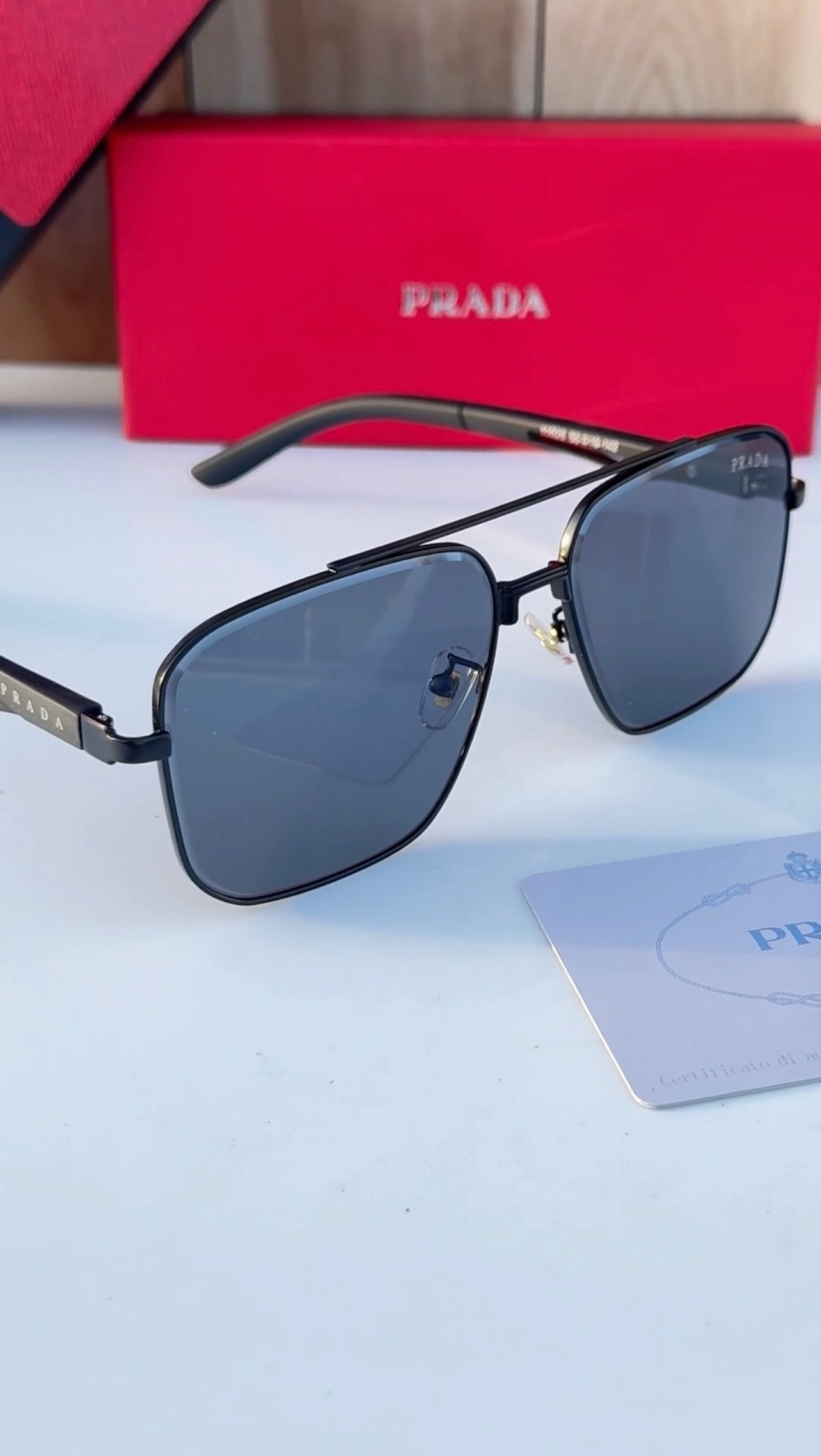 PRADA Noir 55 — Signature Metal Frame