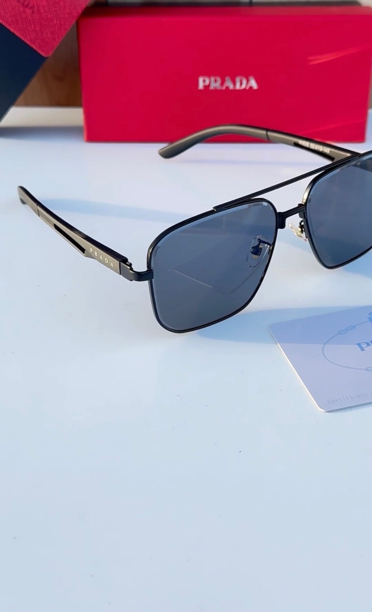 PRADA Noir 55 — Signature Metal Frame