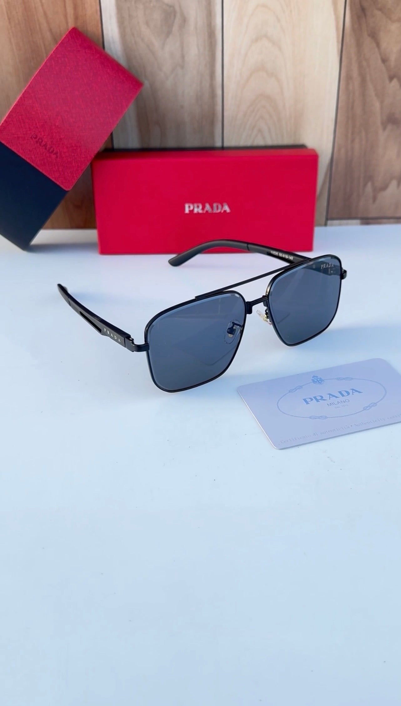PRADA Noir 55 — Signature Metal Frame