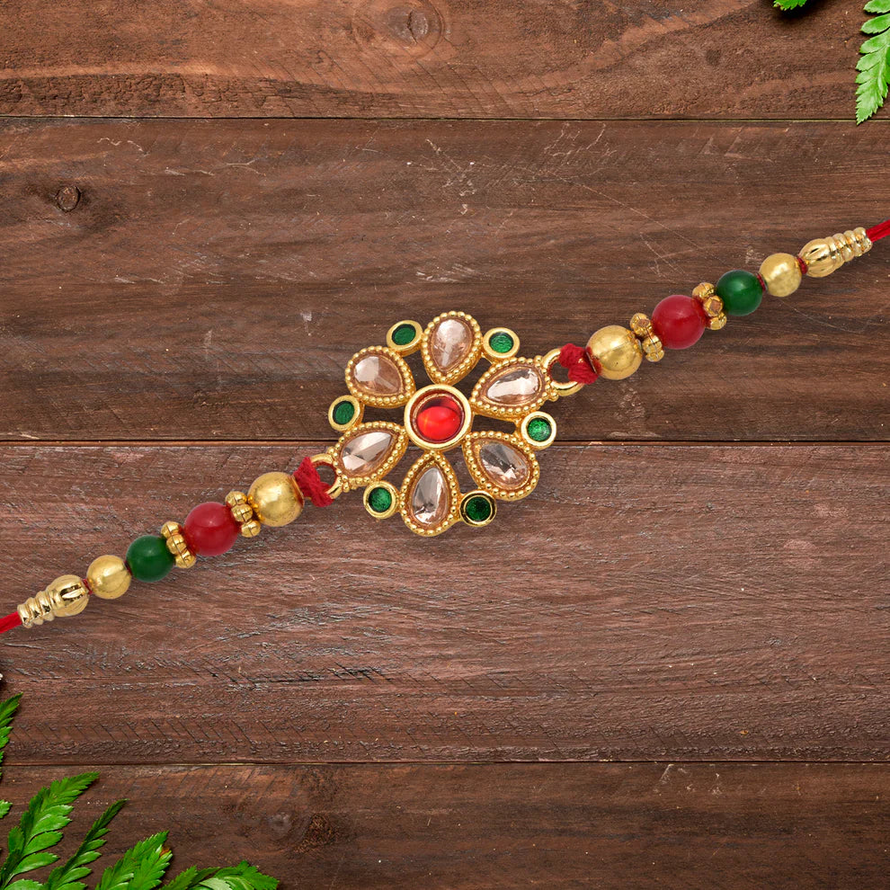 Rakhi – Elegant Floral Golden