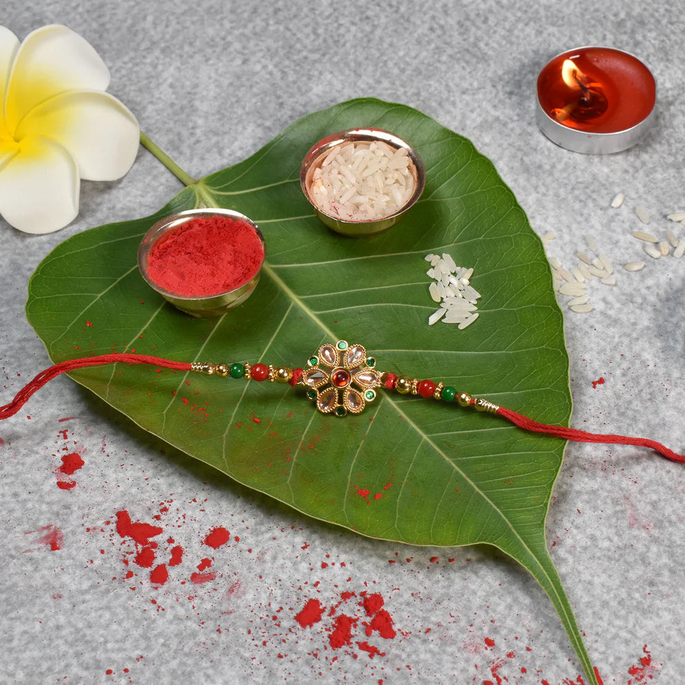 Rakhi – Elegant Floral Golden